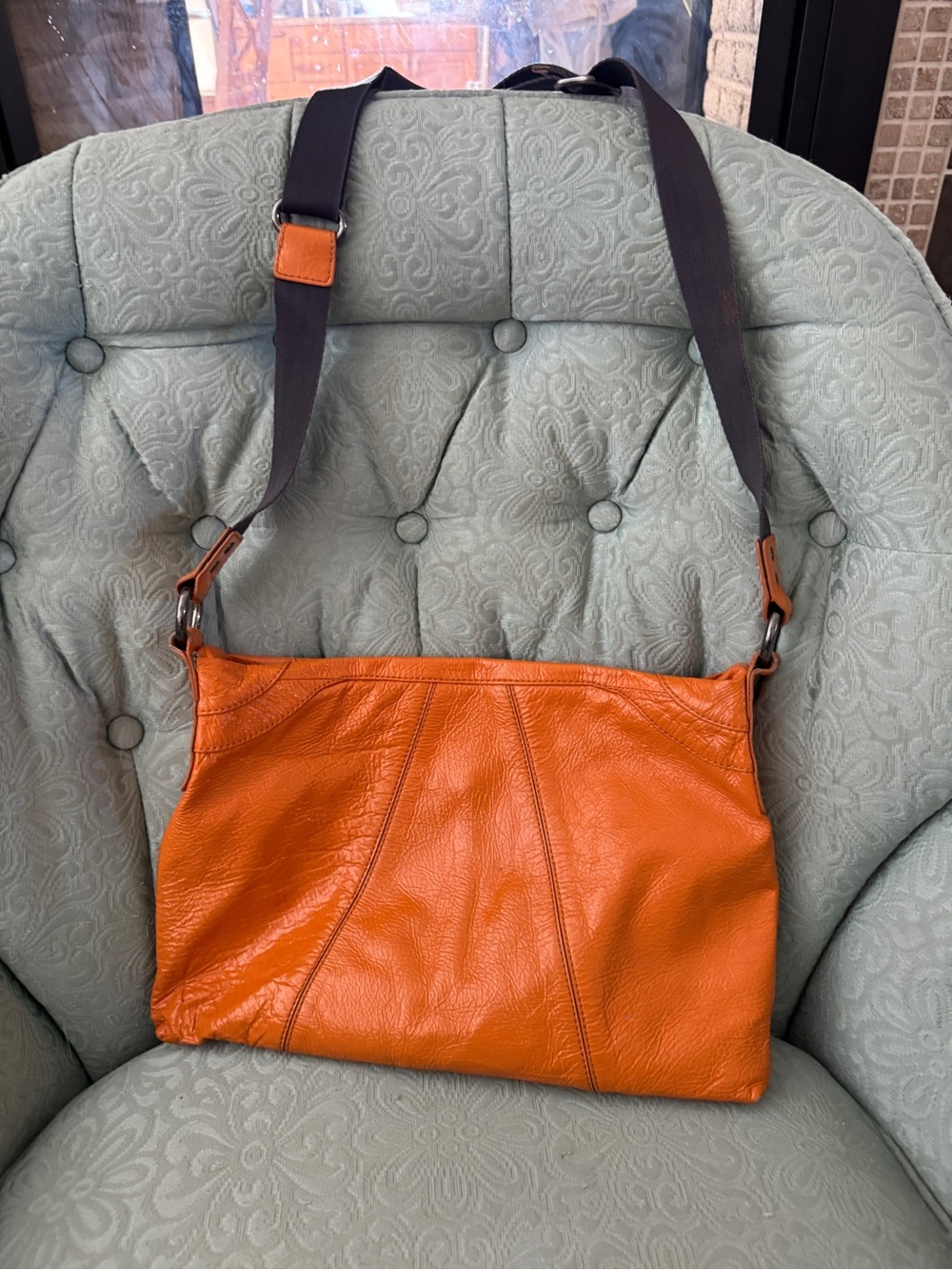Bright orange HOBO bag